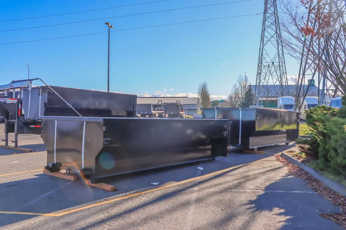 Roll-off dumpster ready for waste disposal at job site for Yard Waste Dumpster Rental in Waggaman